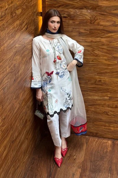 Eman wearing Eclat